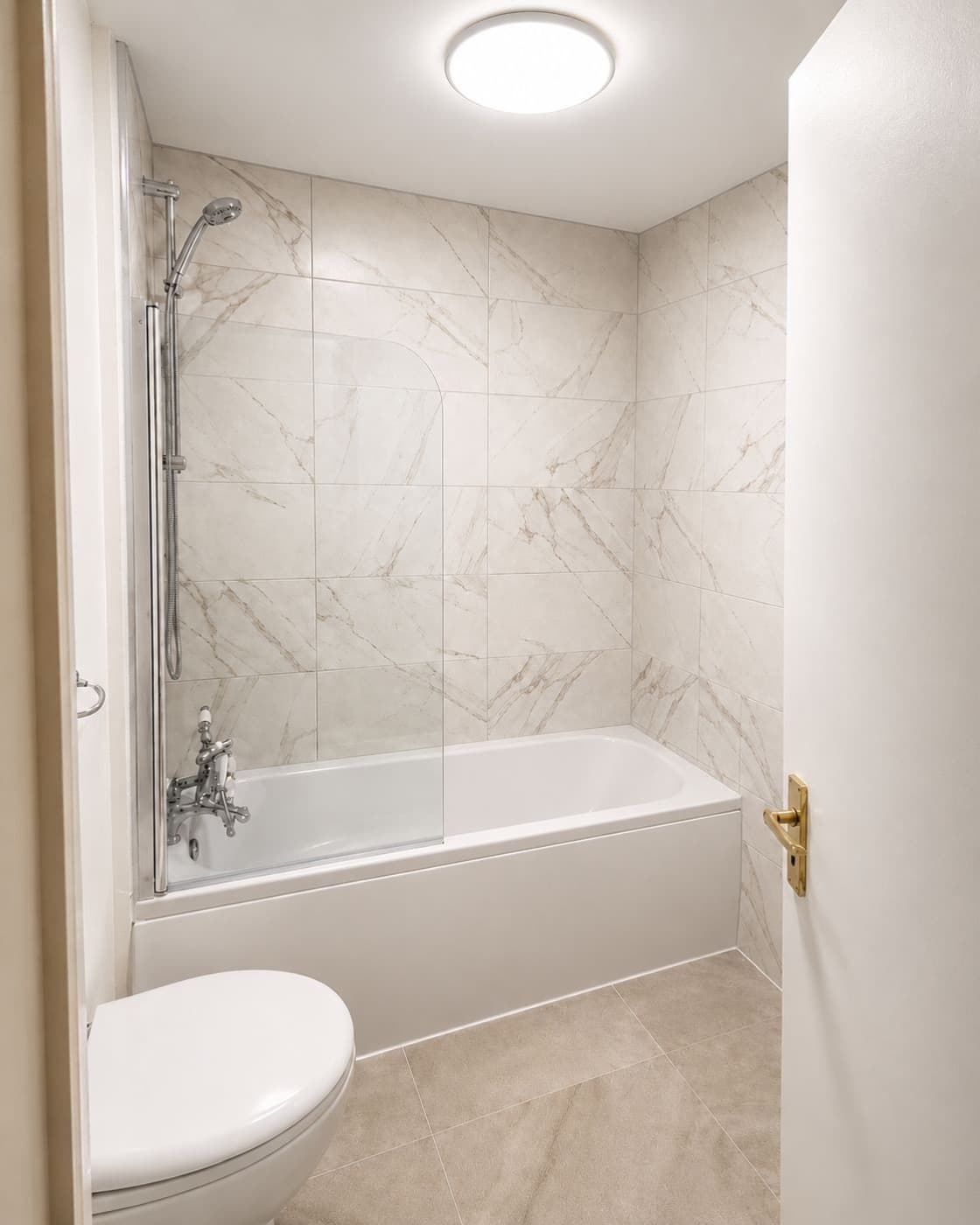 Marble Family Bathroom in Hammersmith, after